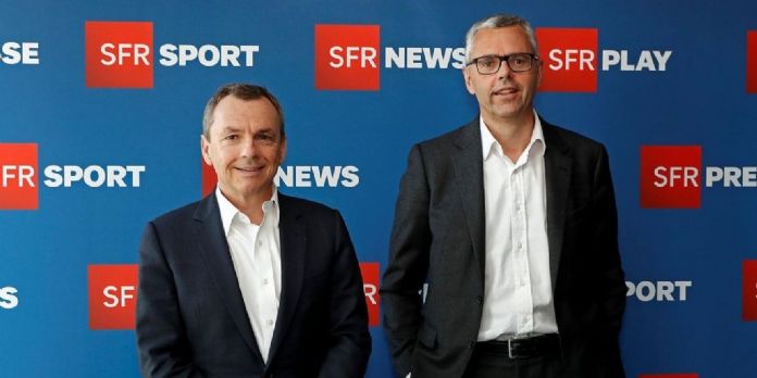 Alain Weill (PDG NextradioTV) et Michel Combes (président SFR)